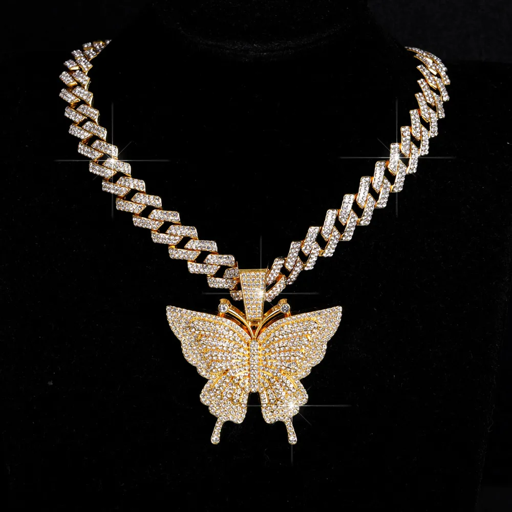 🦋 MAKE YOUR LOOK HIT DIFFERENT. ✨  Turn heads with an Iced-Out Butterfly Pendant that brings serious shine to every fit. Bold Cuban-link style. Statement butterfly design. Maximum sparkle from every angle. 💎