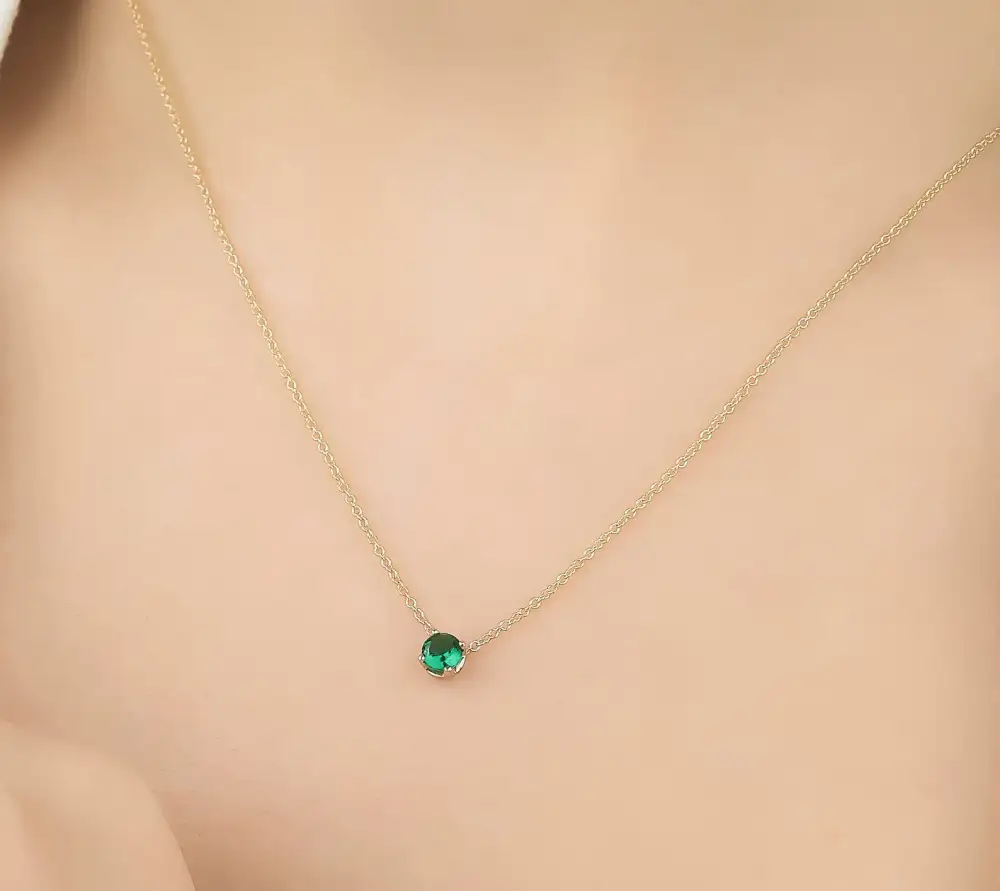 Delicate Prong Set Solitaire Emerald Necklace
