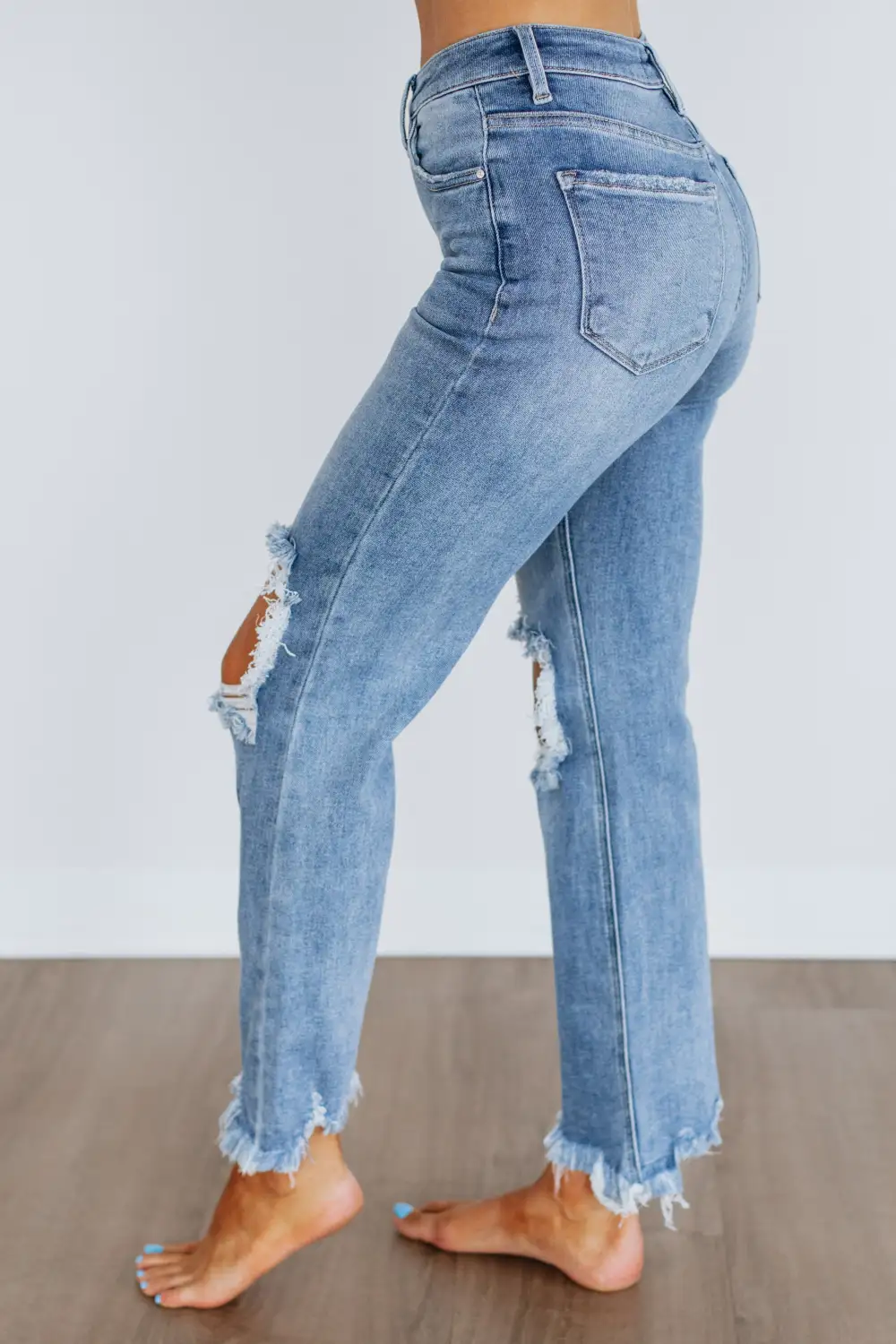 Women's High Rise Frayed Hem Stretch Denim Jeans