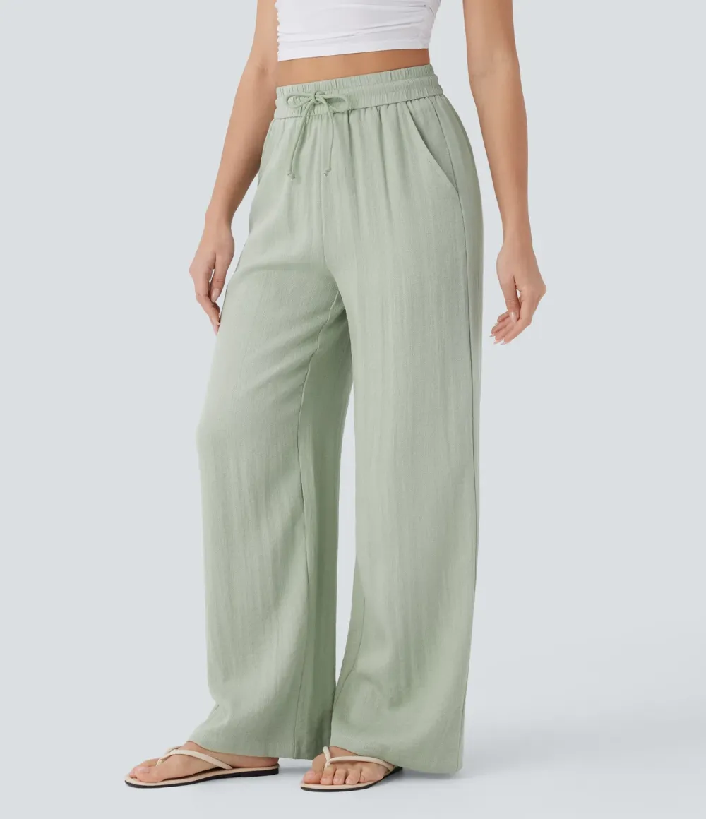2026🔥  Wide-leg, flowing, high-waisted trousers with drawstring, side pockets and a linen look