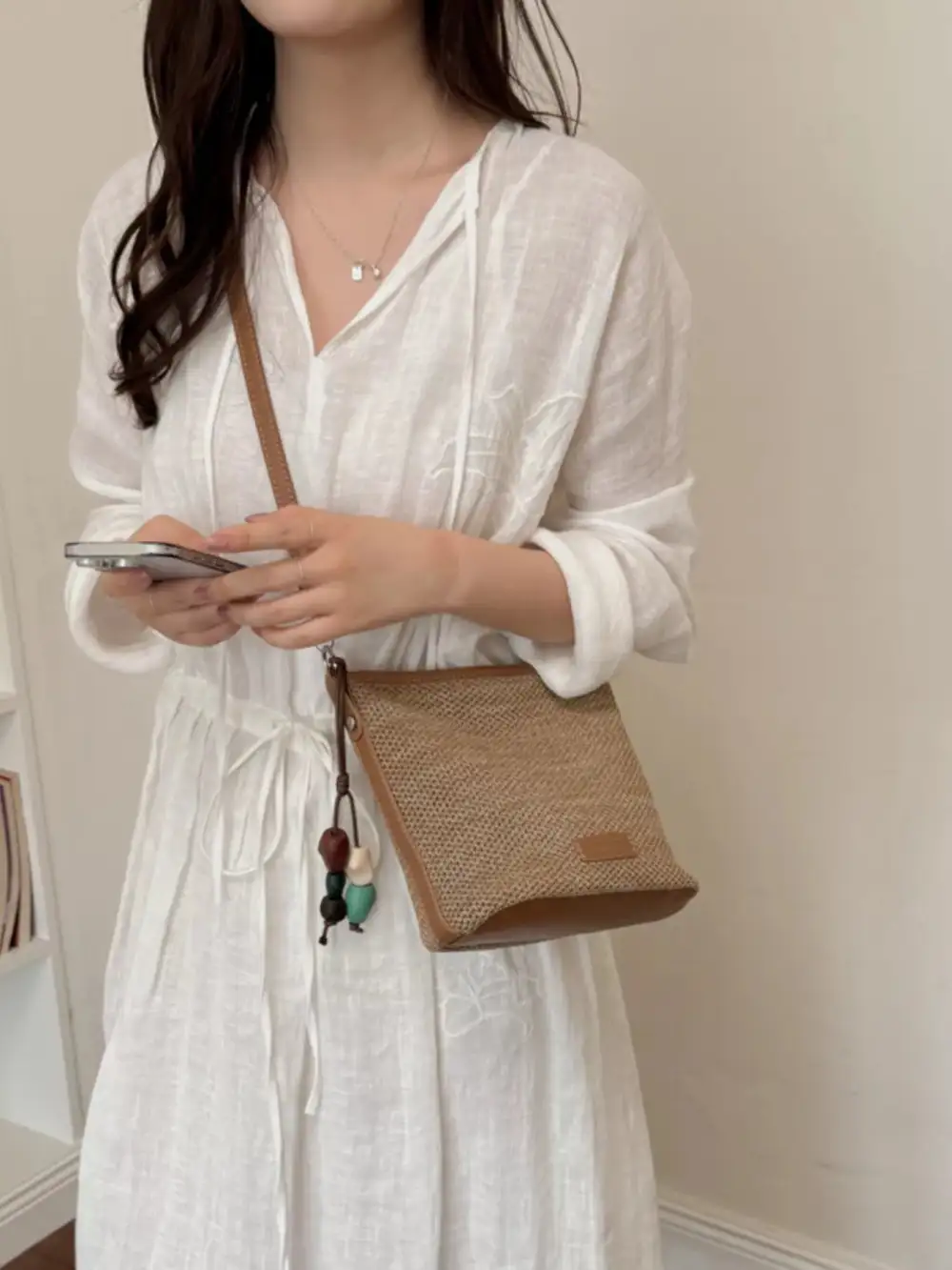 Women's Straw Crossbody Bag with Leather-Look Trim and Tassel Charm