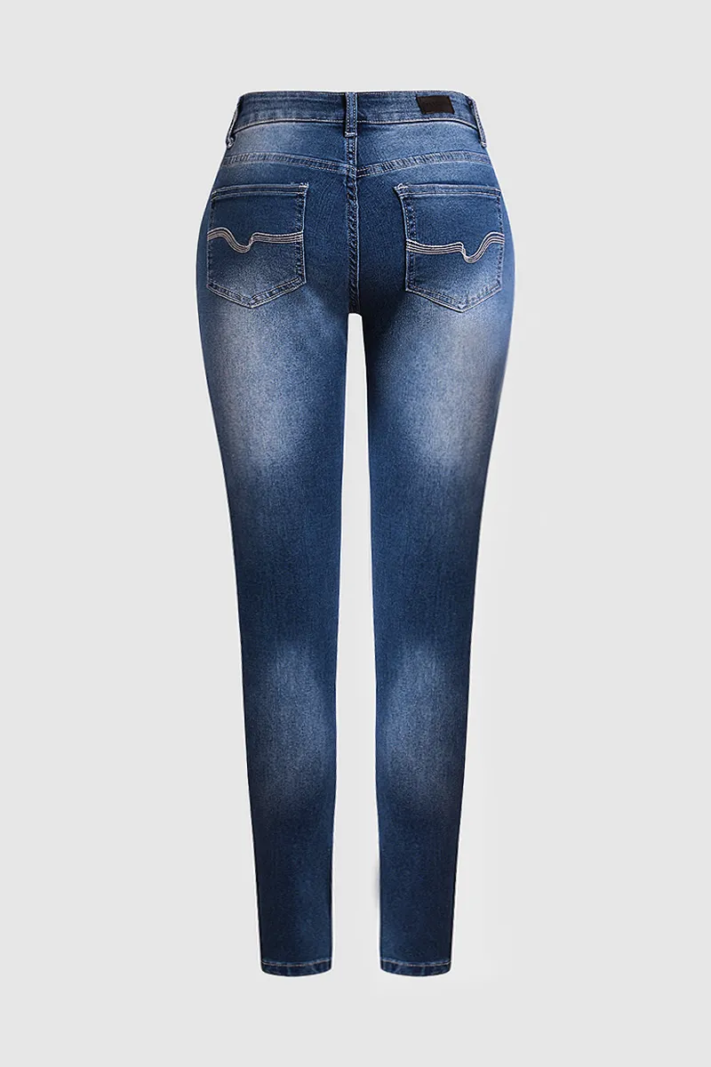 Distressed Low Rise Skinny Jeans