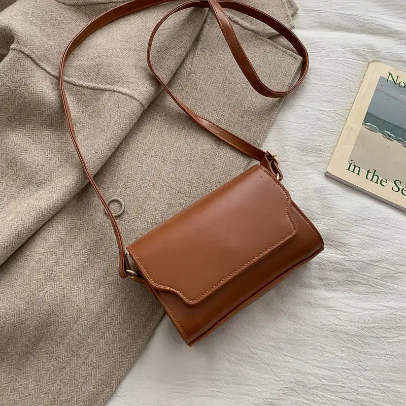 Refined Leather: Mini Leather Messenger Bag