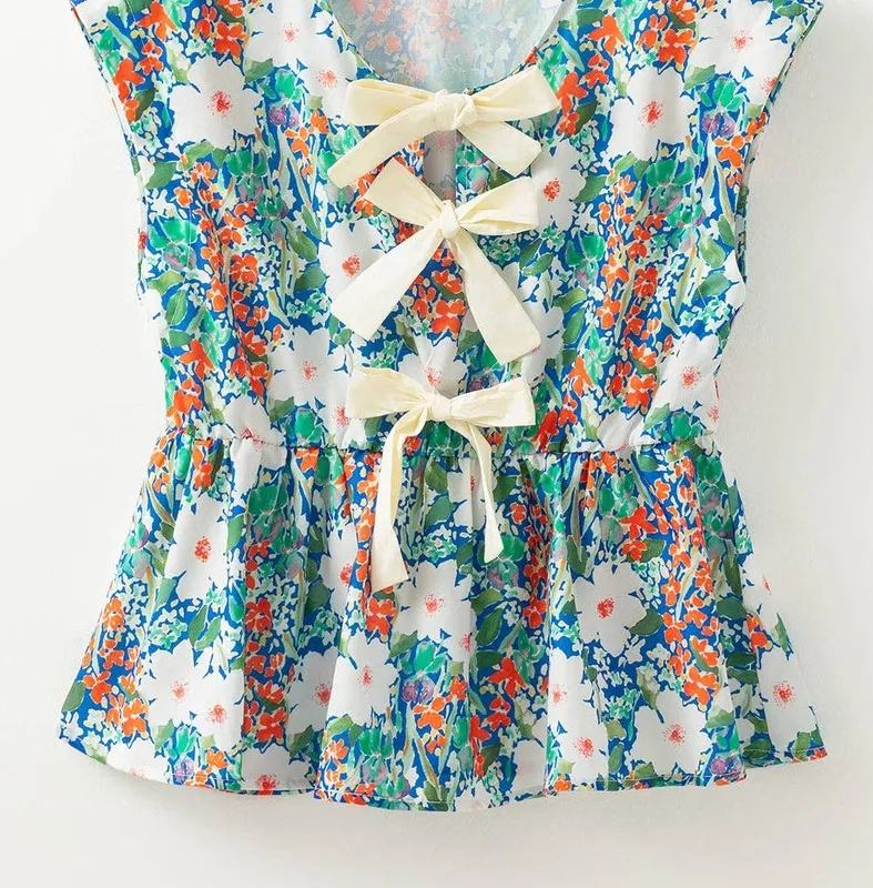 Floral Bow Tie Sleeveless Peplum Blouse