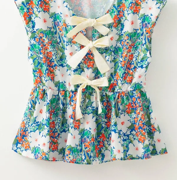 Floral Bow Tie Sleeveless Peplum Blouse