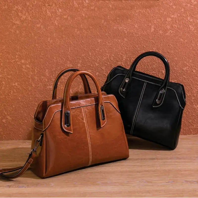 Structured Heritage: Genuine Leather Buckle-Handle Handbag