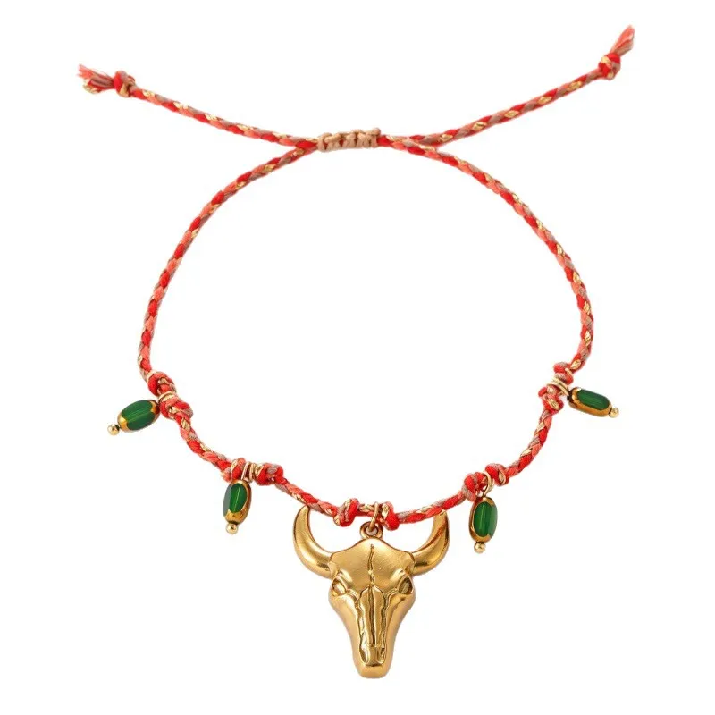 A little western. A little boho. A whole lot of personality.  Featuring a statement bull skull charm, colorful braided details and delicate bead accents, this bracelet instantly gives your everyday look a more adventurous edge.