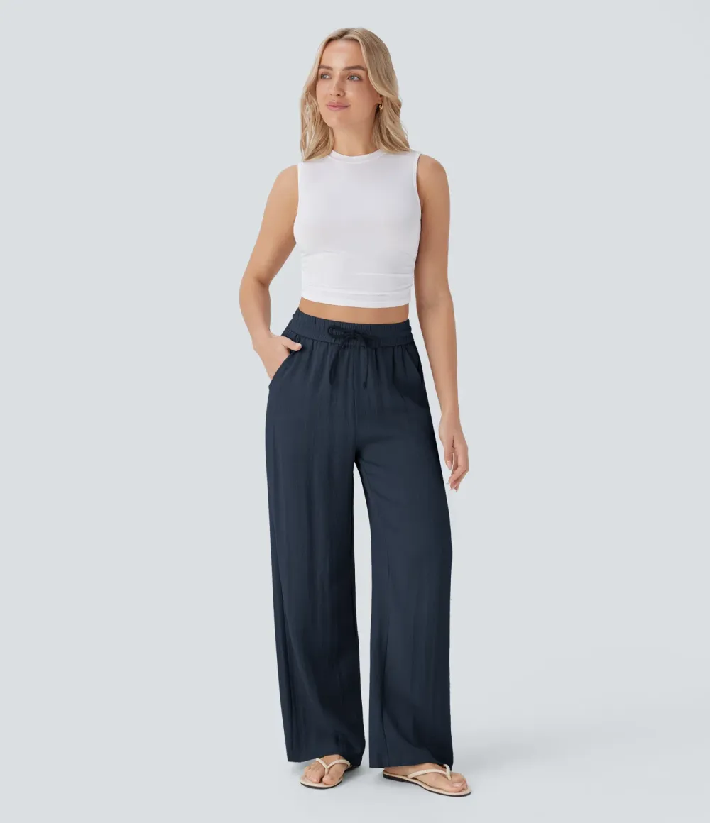 2026🔥  Wide-leg, flowing, high-waisted trousers with drawstring, side pockets and a linen look