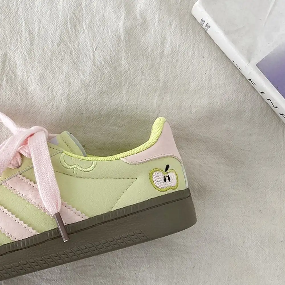 Apple on Toe Green Sneakers
