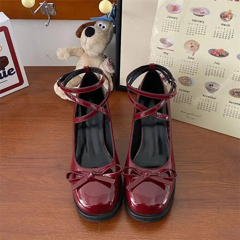 Bow-Detail Mary-Jane Round-Toe Pumps
