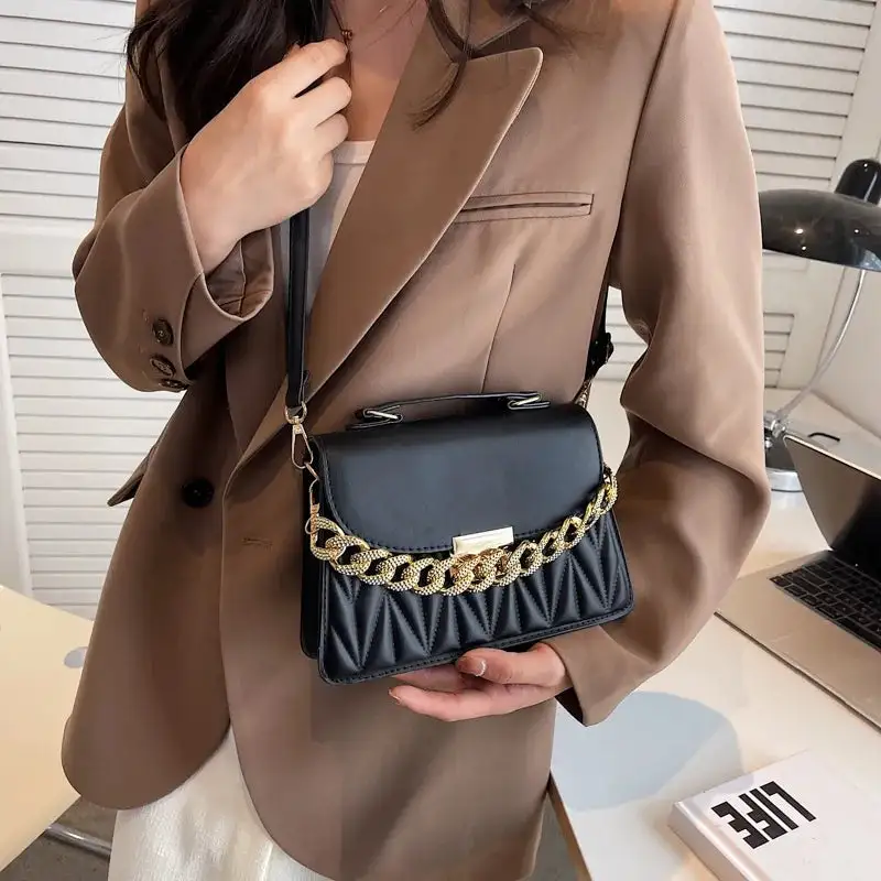 Evening Statement: Designer Chain-Detail Handbag