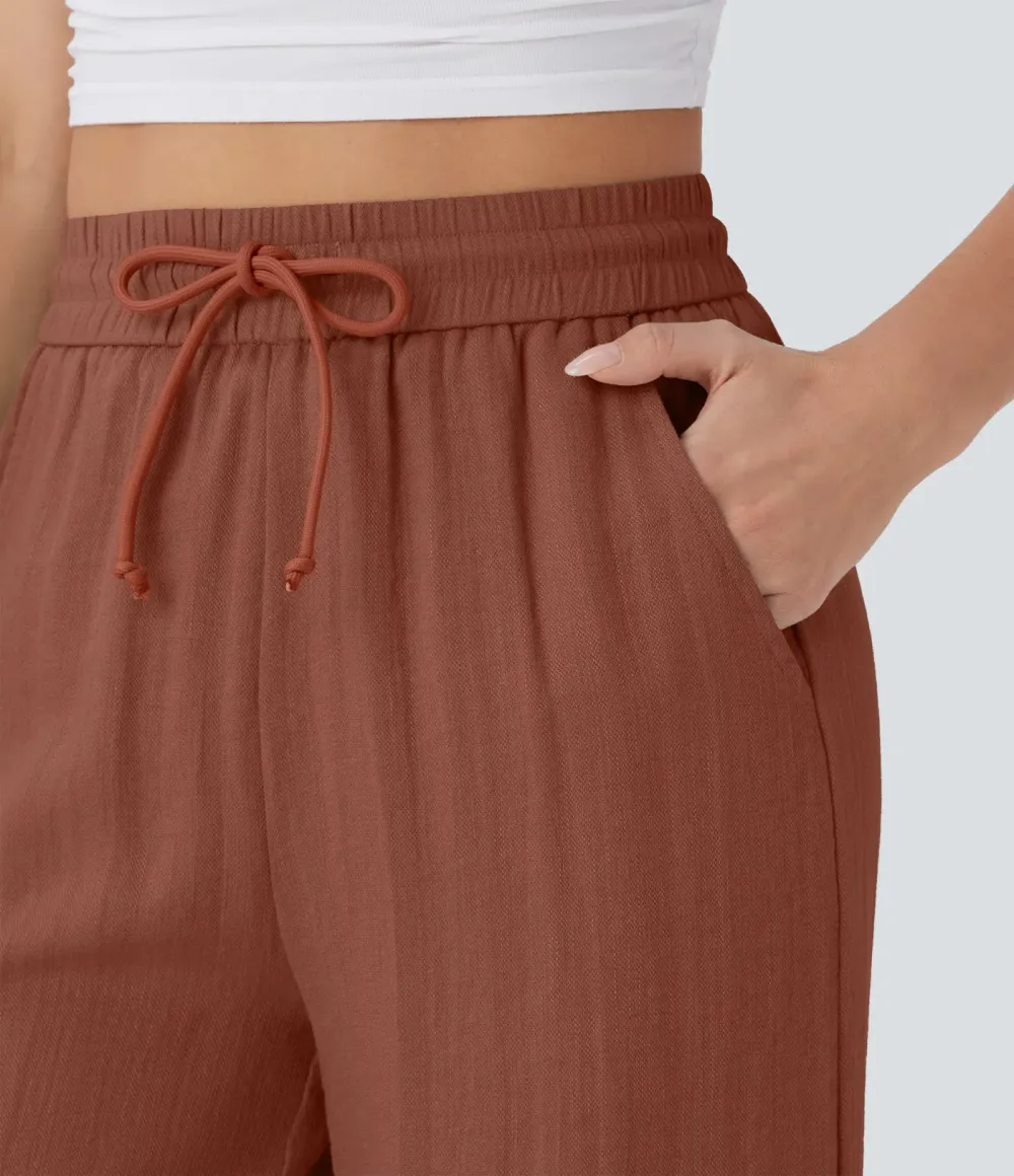 2026🔥  Wide-leg, flowing, high-waisted trousers with drawstring, side pockets and a linen look