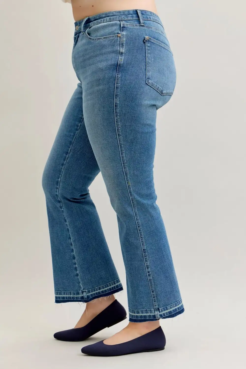 Mid Rise Raw Hem Bootcut Jeans