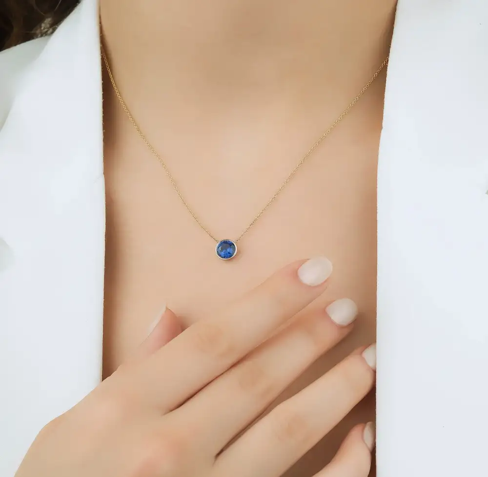 Delicate Bezel Set Solitaire Sapphire Necklace