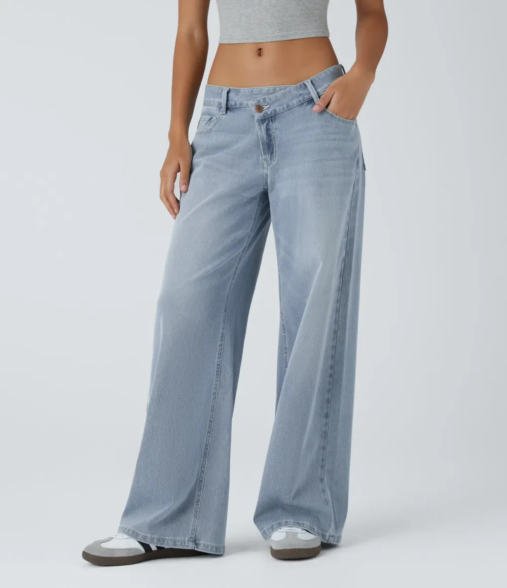 2026🔥  Low-rise wide-leg asymmetric jeans with button, zip, and multiple pockets; stretch knit fabric with a washed finish.