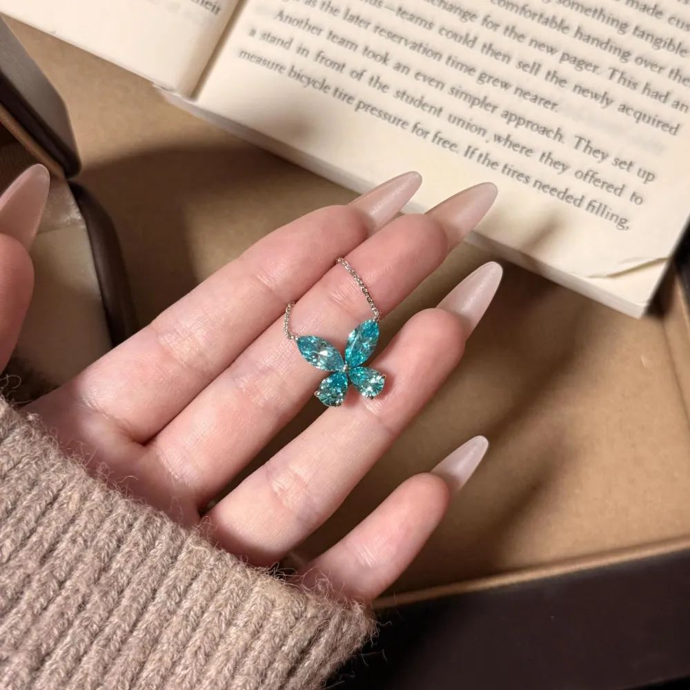 🦋 A little sparkle can change the whole look.  This stunning blue butterfly necklace catches the light beautifully from every angle. Delicate, elegant, and effortlessly eye-catching — perfect for adding a touch of color to your everyday style. ✨