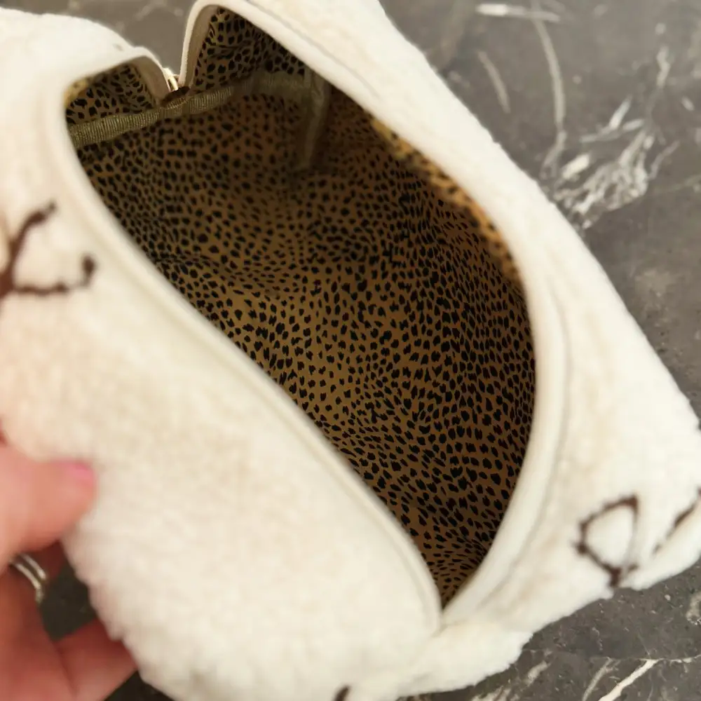 Bouclé Bow Cosmetic Case – Soft Structured Makeup Pouch for Travel or Daily Essentials