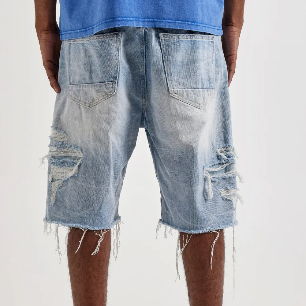 Relaxed Distressed Denim Shorts
