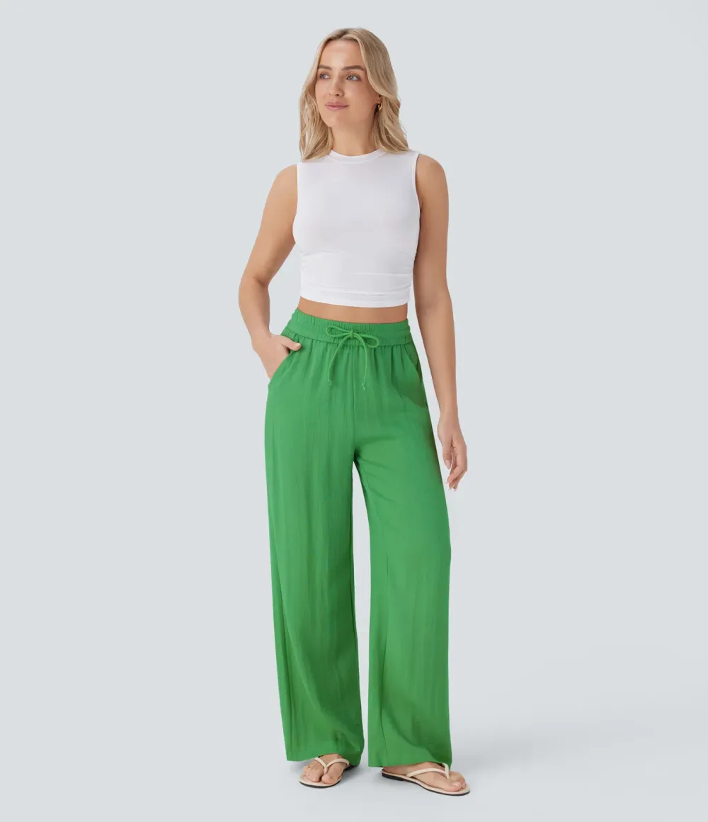 2026🔥  Wide-leg, flowing, high-waisted trousers with drawstring, side pockets and a linen look