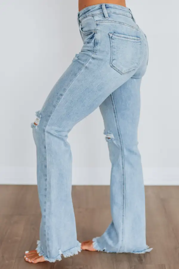 Women's High Rise Flared Leg Raw Hem Jeans