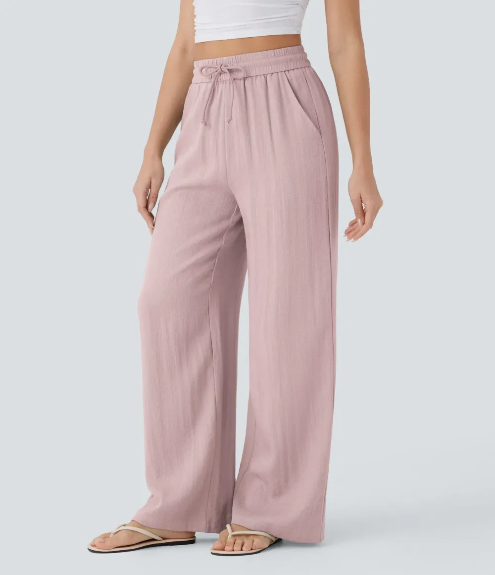 2026🔥  Wide-leg, flowing, high-waisted trousers with drawstring, side pockets and a linen look