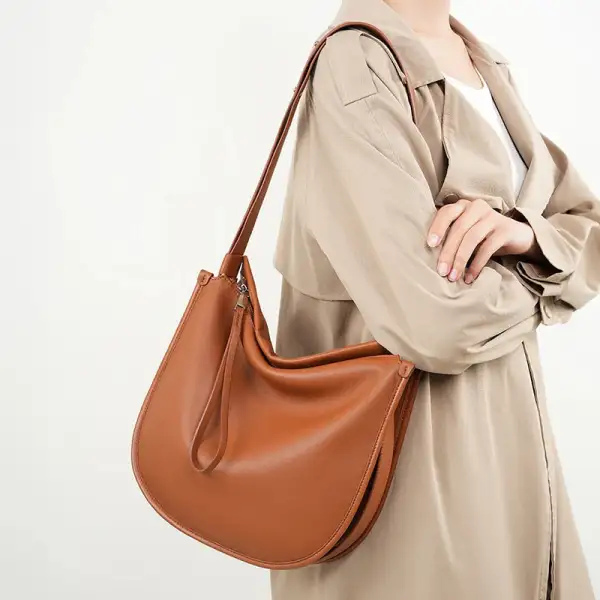 Premium Texture: High-Quality Genuine Leather Zippered Tote