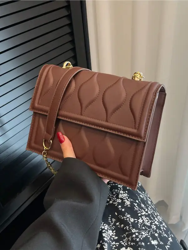 Embossed Stereo Shoulder Bag