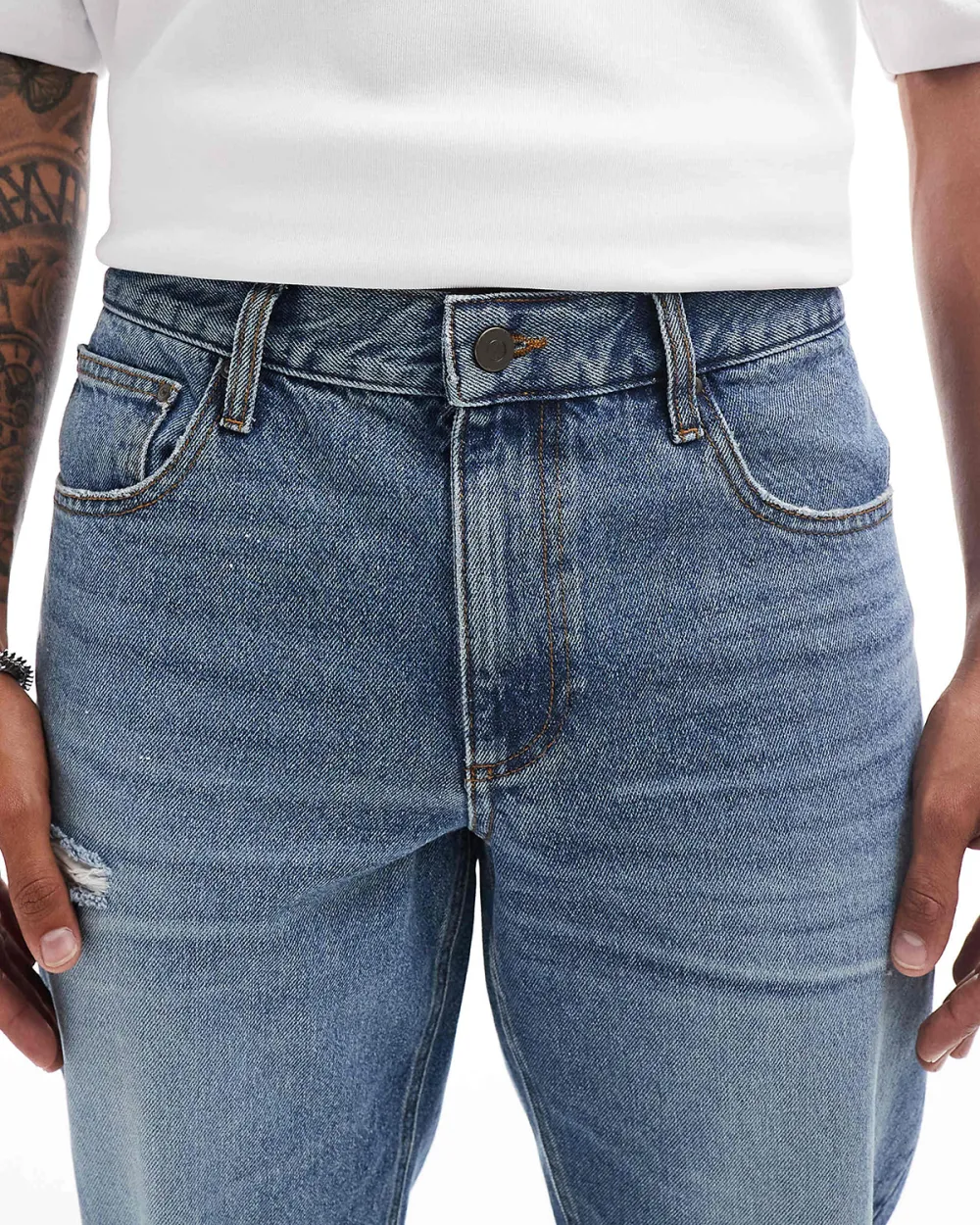 Tapered Jeans With Abrasions In Midwash Blue