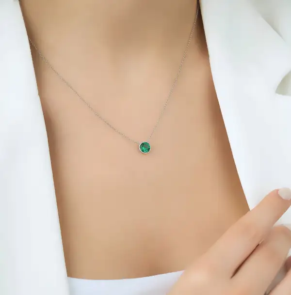 Dainty Bezel Set Solitaire Emerald Necklace