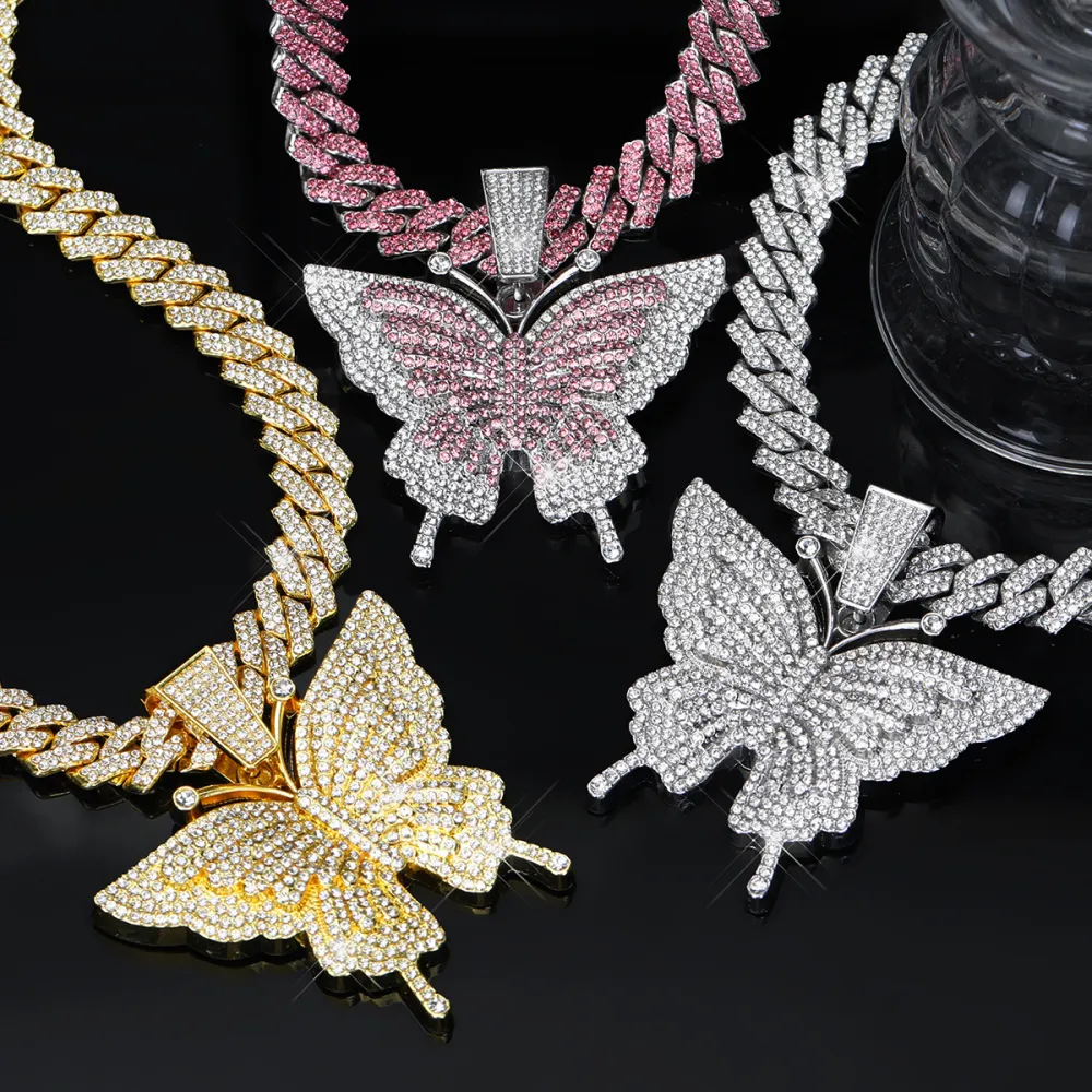 🦋 MAKE YOUR LOOK HIT DIFFERENT. ✨  Turn heads with an Iced-Out Butterfly Pendant that brings serious shine to every fit. Bold Cuban-link style. Statement butterfly design. Maximum sparkle from every angle. 💎