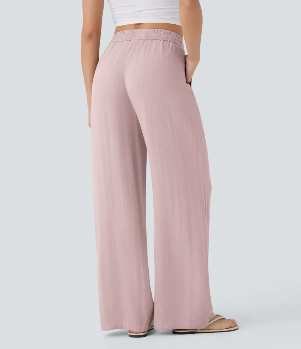 2026🔥  Wide-leg, flowing, high-waisted trousers with drawstring, side pockets and a linen look