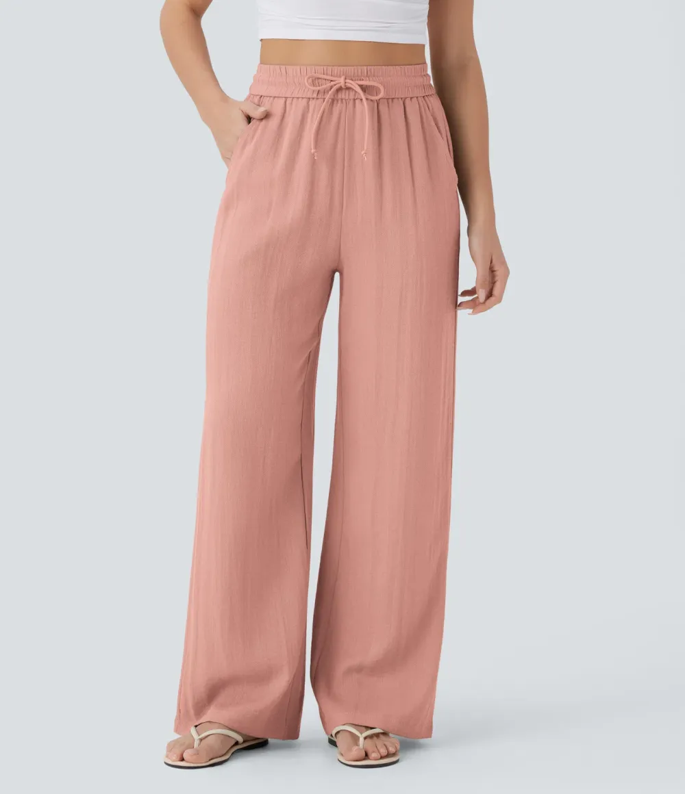 2026🔥  Wide-leg, flowing, high-waisted trousers with drawstring, side pockets and a linen look
