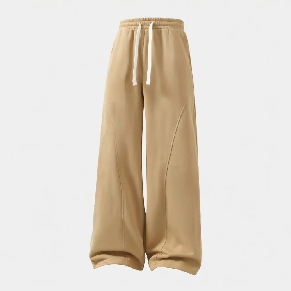 Men's solid-color drawstring trousers with curved hems—casual and comfortable, featuring a relaxed fit suitable for all seasons.
