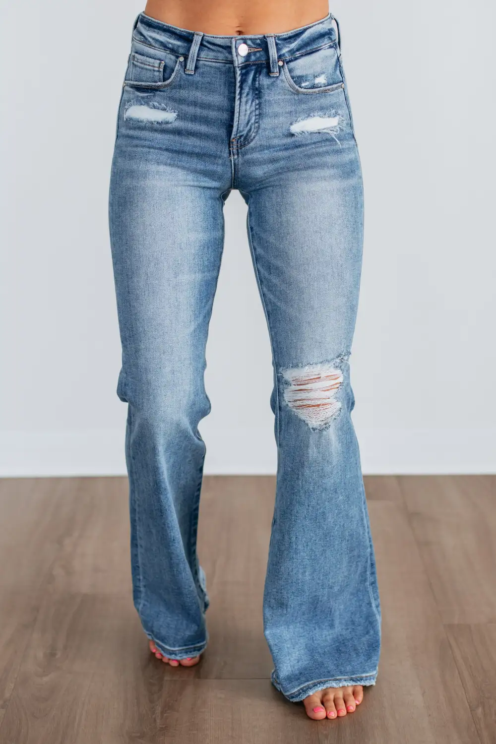Women's Mid Rise Flared Leg Tummy Control Jeans