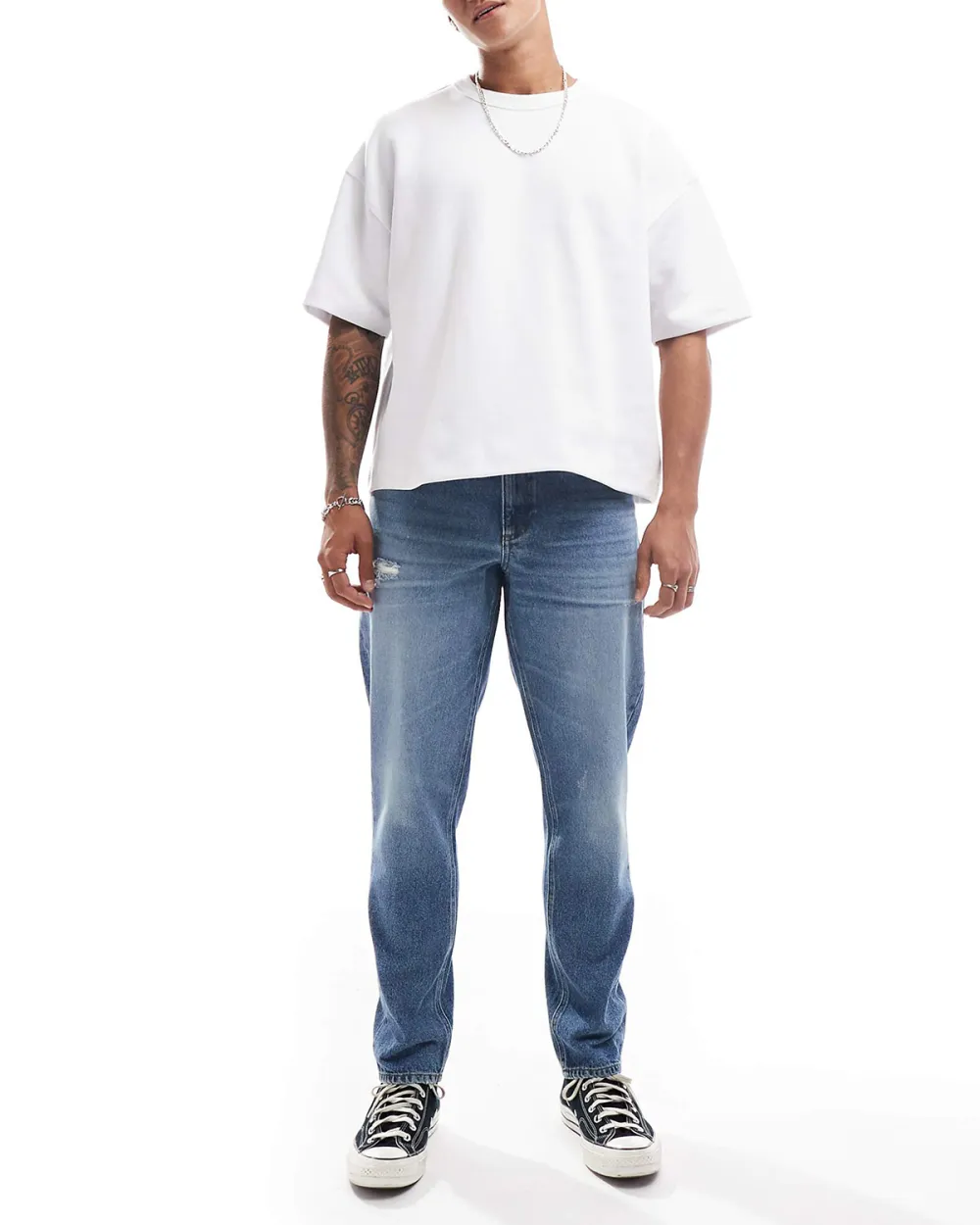 Tapered Jeans With Abrasions In Midwash Blue
