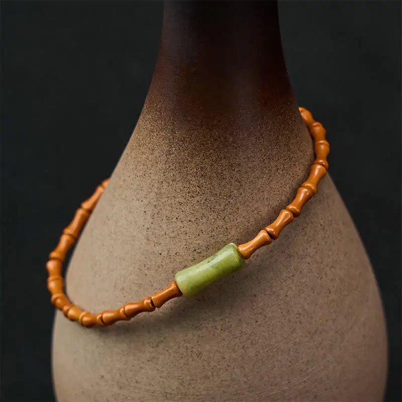 Natural Olive Pit Peridot Bamboo Design Bracelet