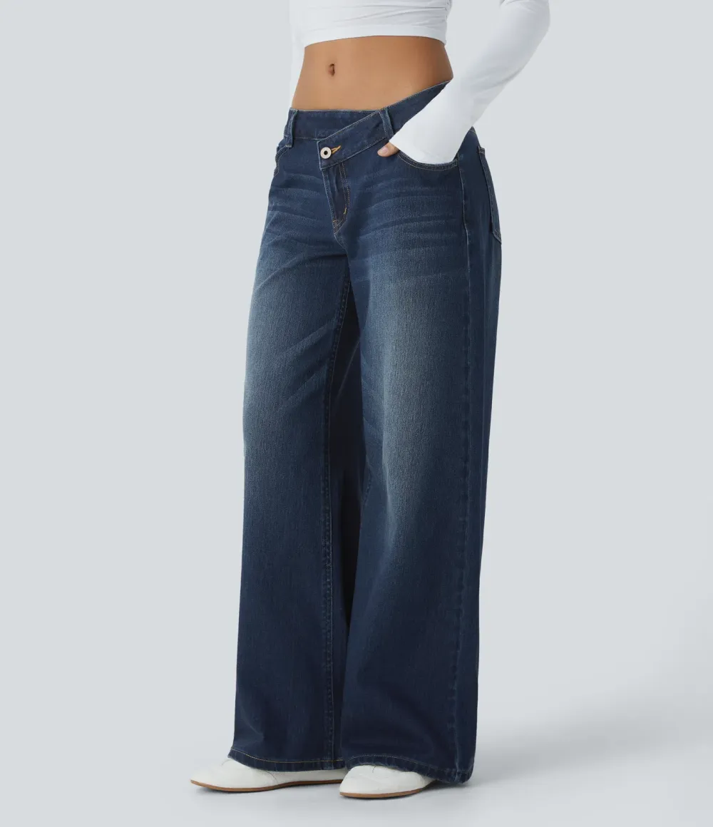 2026🔥  Low-rise wide-leg asymmetric jeans with button, zip, and multiple pockets; stretch knit fabric with a washed finish.