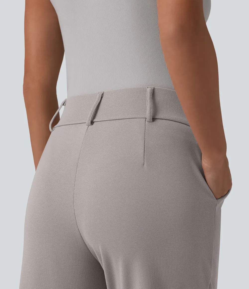  - Tapered office trousers with a high waist, side pockets and waffle fabric