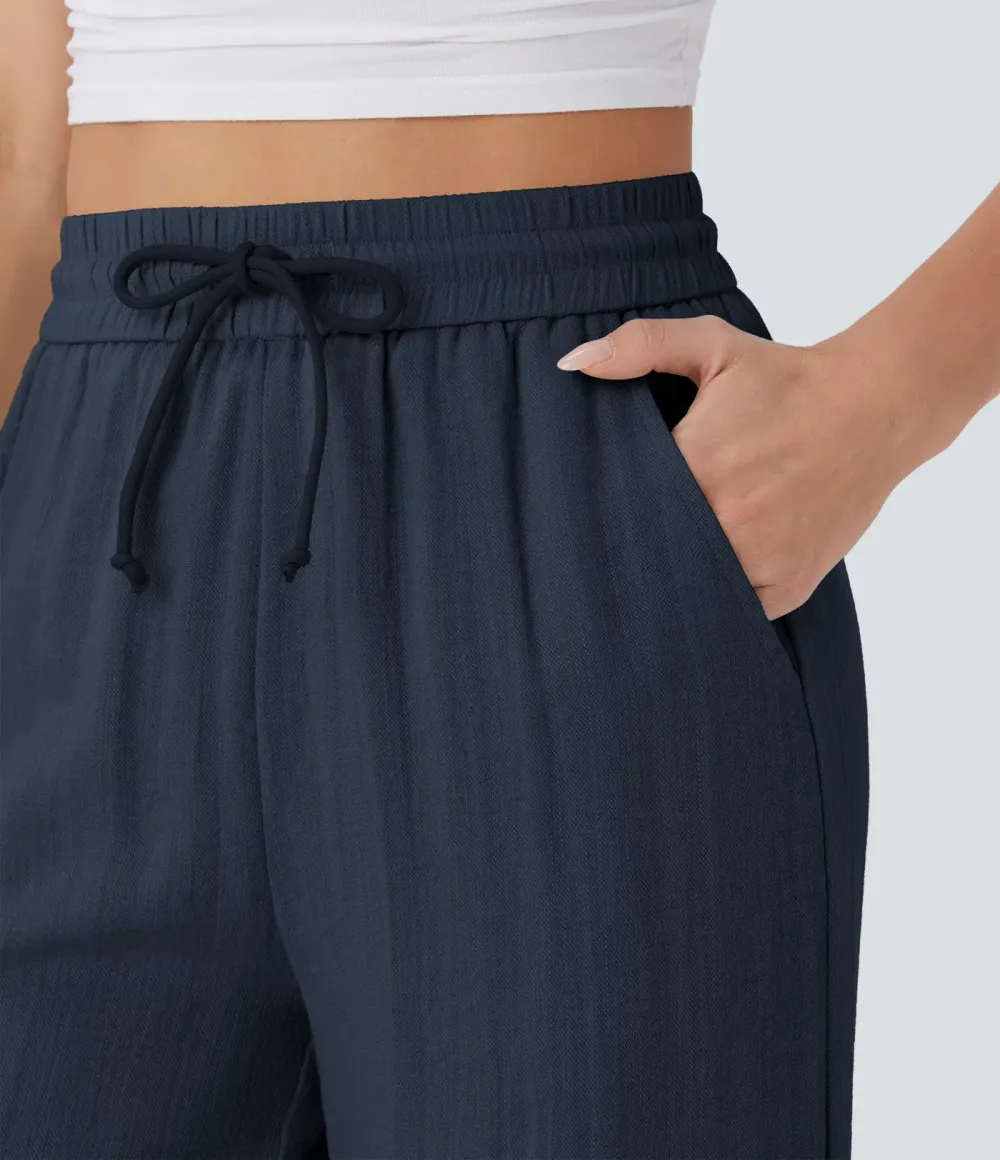 2026🔥  Wide-leg, flowing, high-waisted trousers with drawstring, side pockets and a linen look