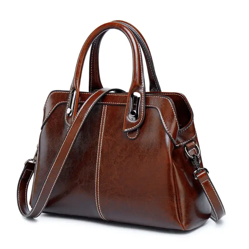 Structured Heritage: Genuine Leather Buckle-Handle Handbag