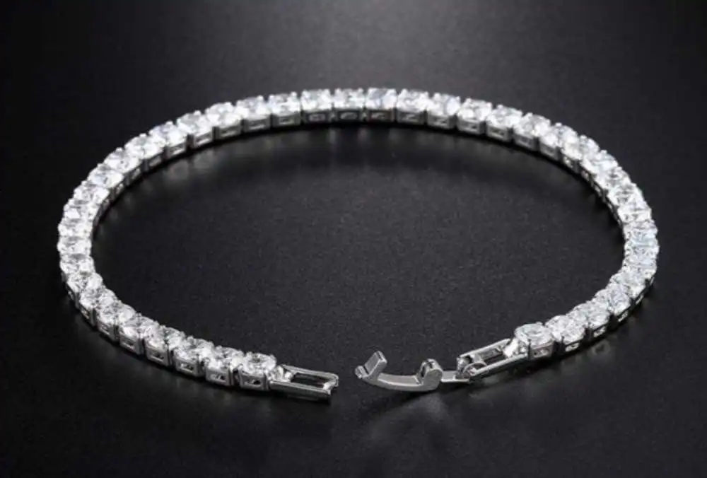 Women's Paved Zirconia Tennis Bracelet Fold Over Closure