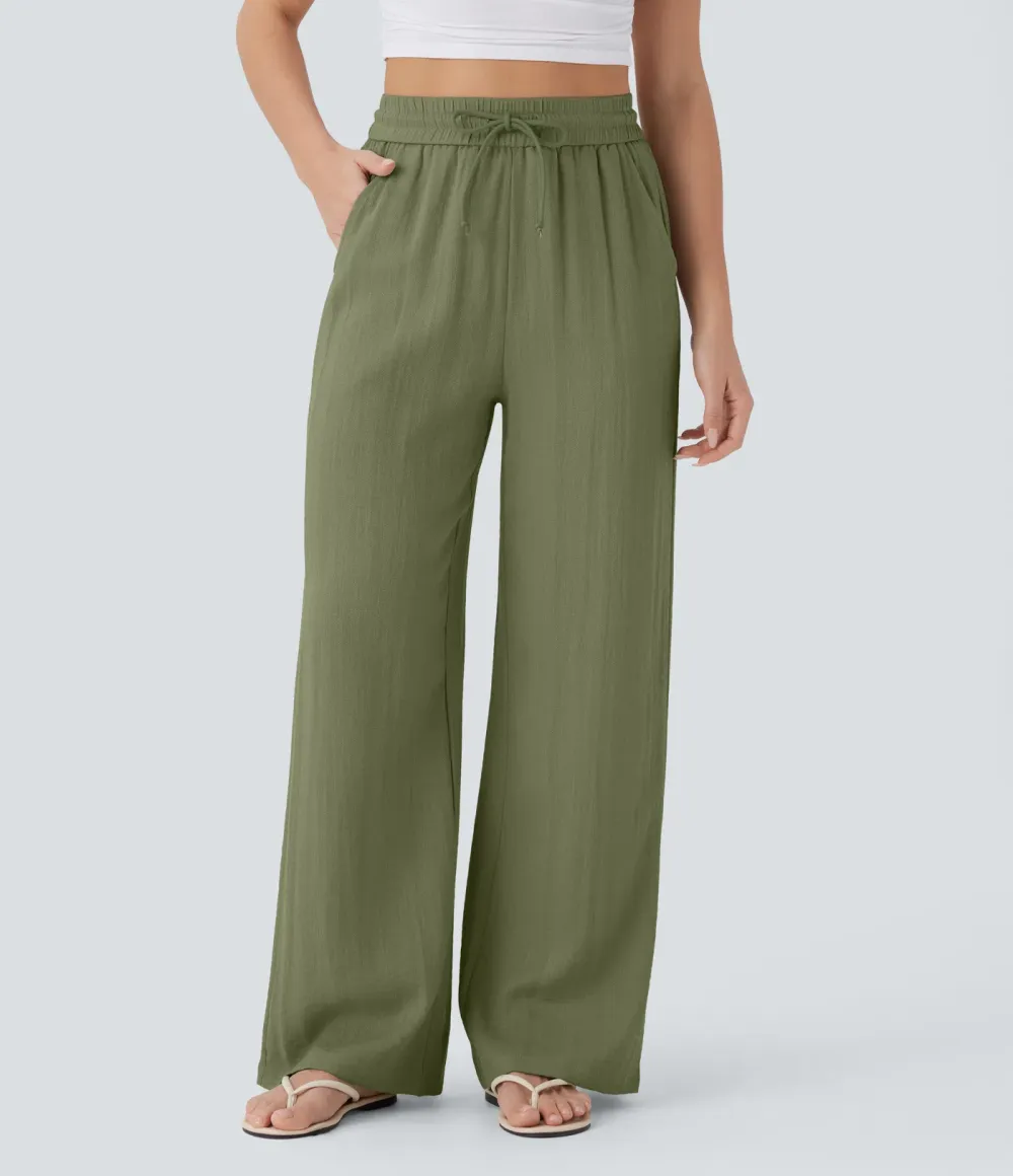 2026🔥  Wide-leg, flowing, high-waisted trousers with drawstring, side pockets and a linen look