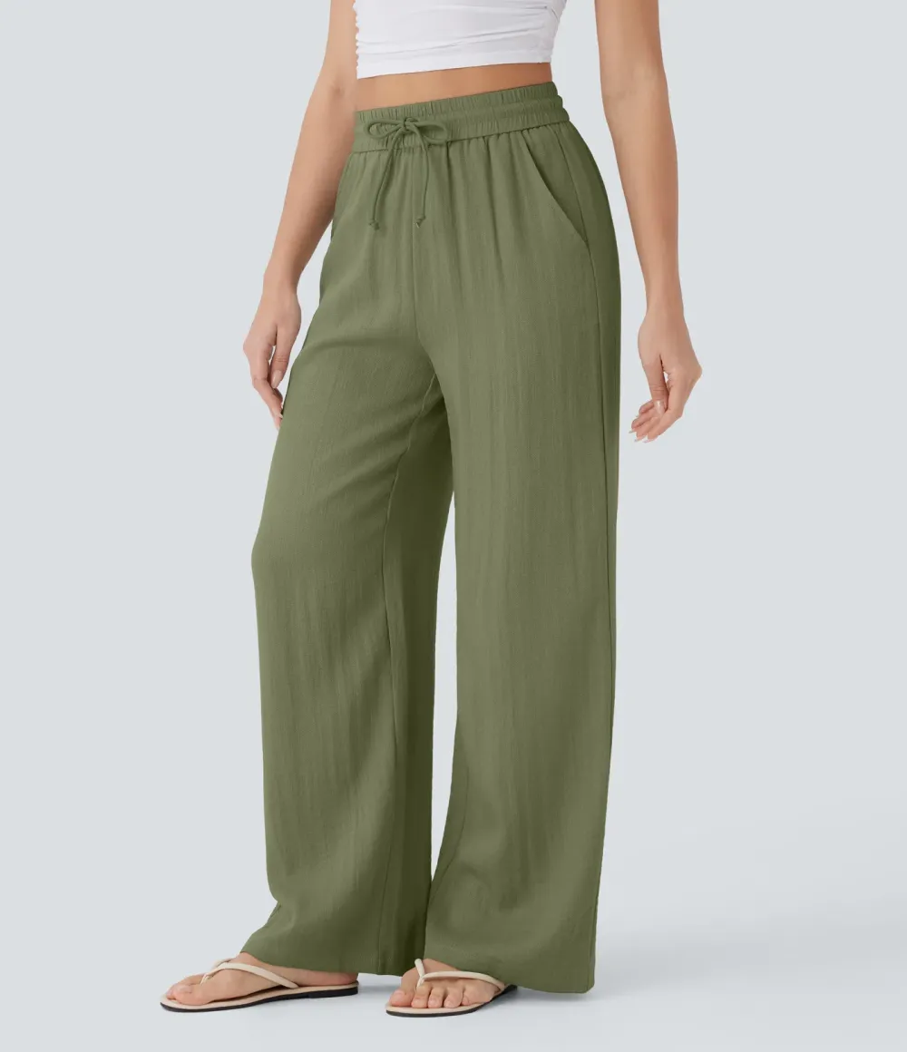 2026🔥  Wide-leg, flowing, high-waisted trousers with drawstring, side pockets and a linen look