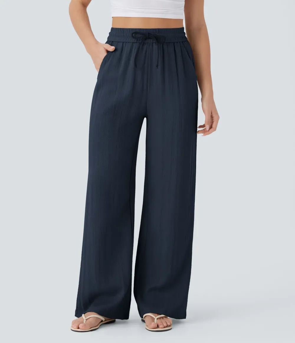 2026🔥  Wide-leg, flowing, high-waisted trousers with drawstring, side pockets and a linen look