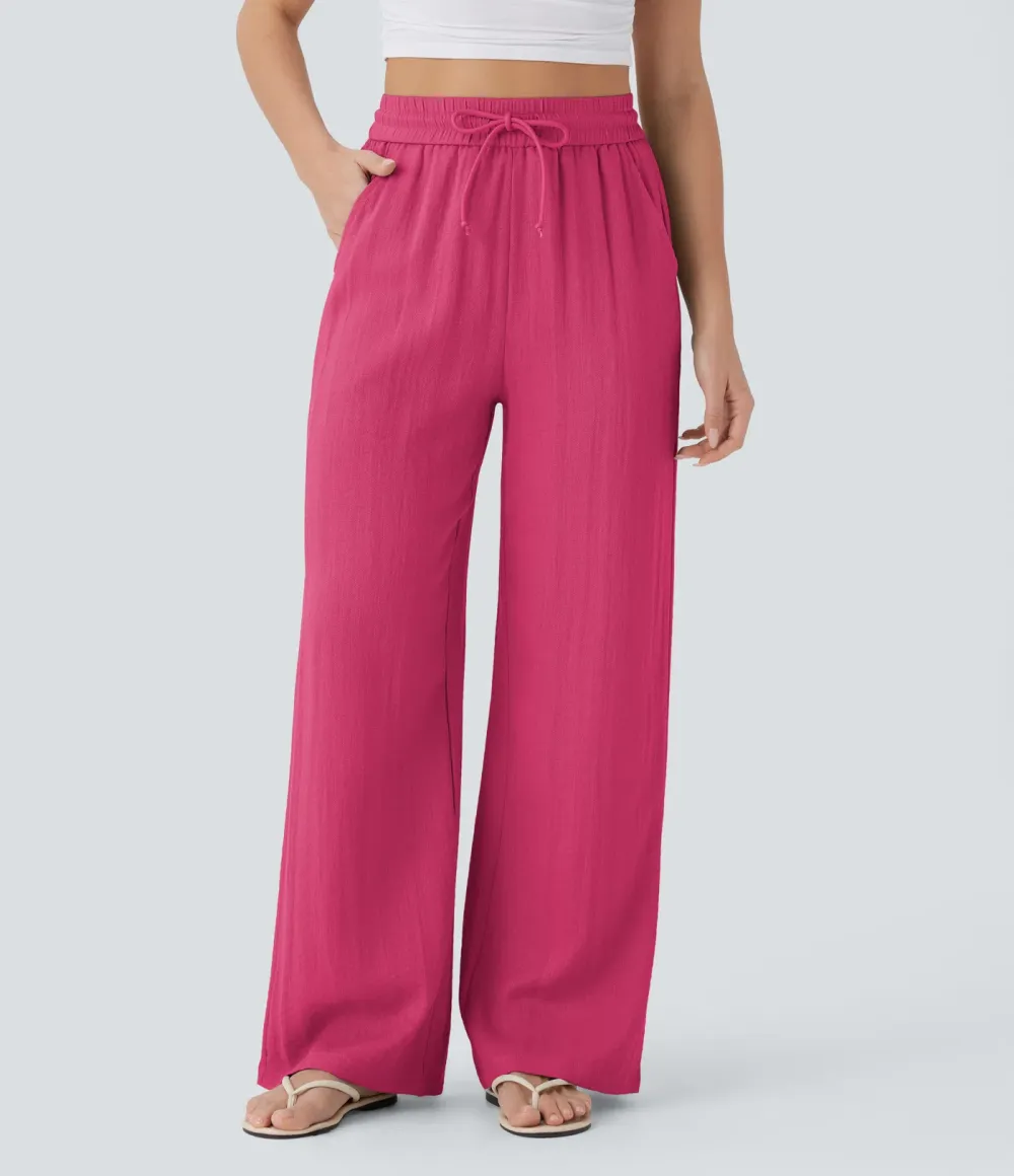2026🔥  Wide-leg, flowing, high-waisted trousers with drawstring, side pockets and a linen look
