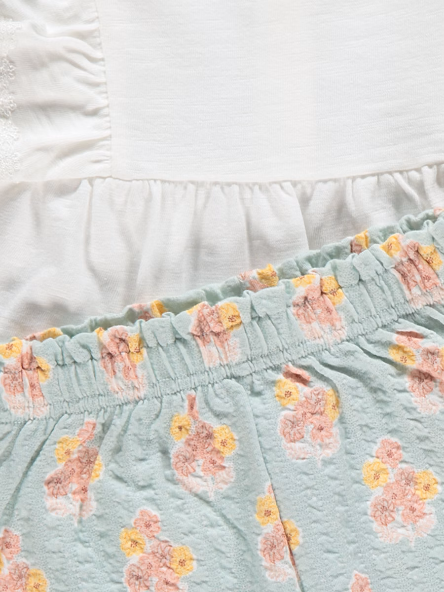 White Frill Top and Floral Trousers Outfit detail 1