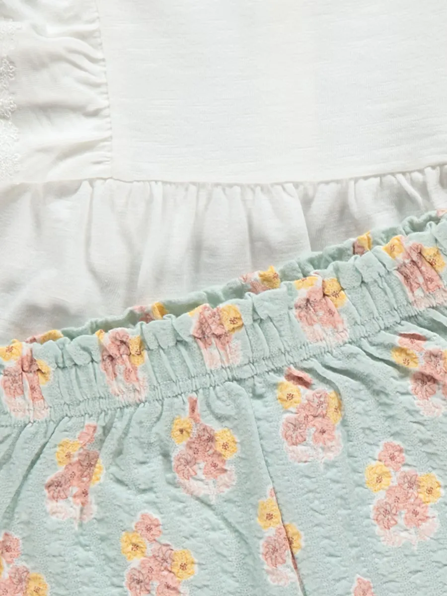 White Frill Top and Floral Trousers Outfit
