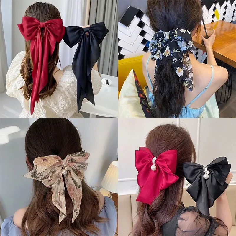 Oversized Satin Bow Hair Clip adds an elegant, feminine finish to everyday hairstyles in seconds. The flowing long-tail design looks beautiful with ponytails, half-up styles, curls and more.
