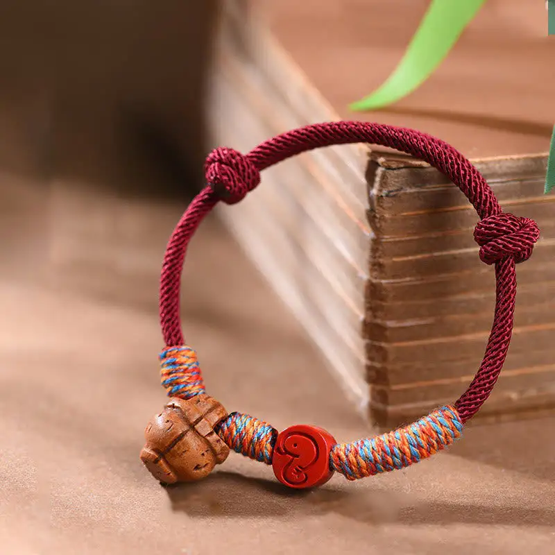 Handmade String Peach Pit Cinnabar Bracelet