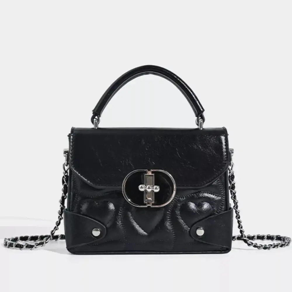 Heart Embossed Flap Crossbody Bag